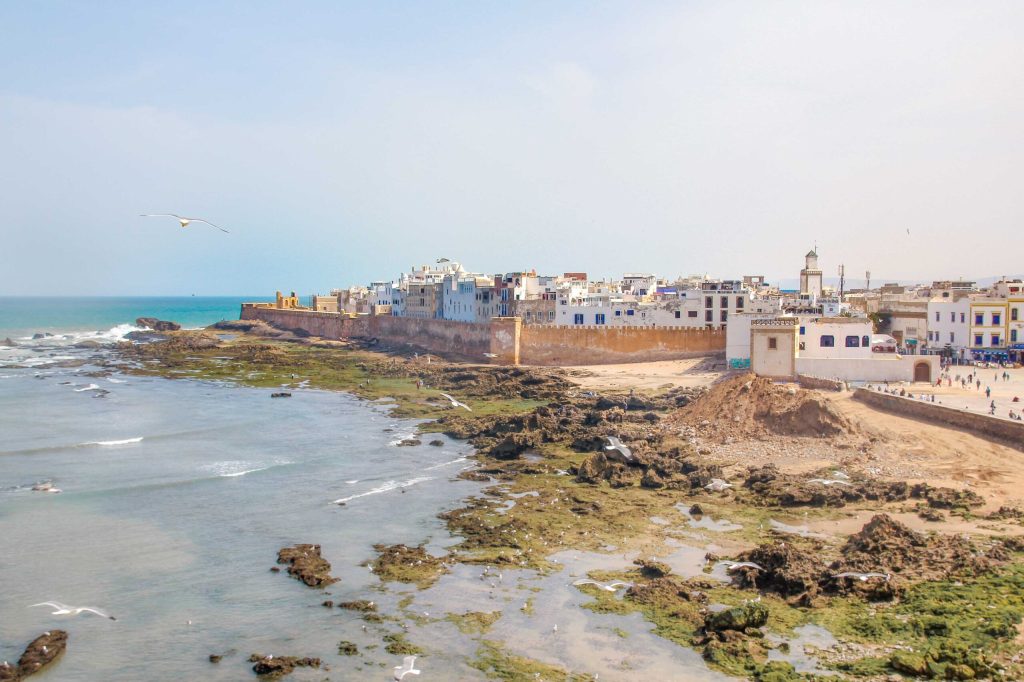 Coastal view of Essaouira, Morocco — a historic port city offering cinematic oceanfront locations, fortified walls, and vibrant medina scenes.